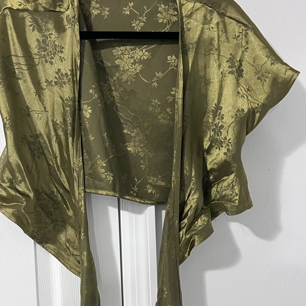 Green floral top. You can tie it in the middle .